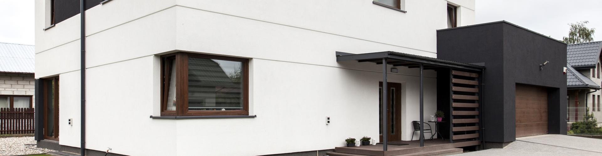 Projekty domów z tarasem nad garażem 